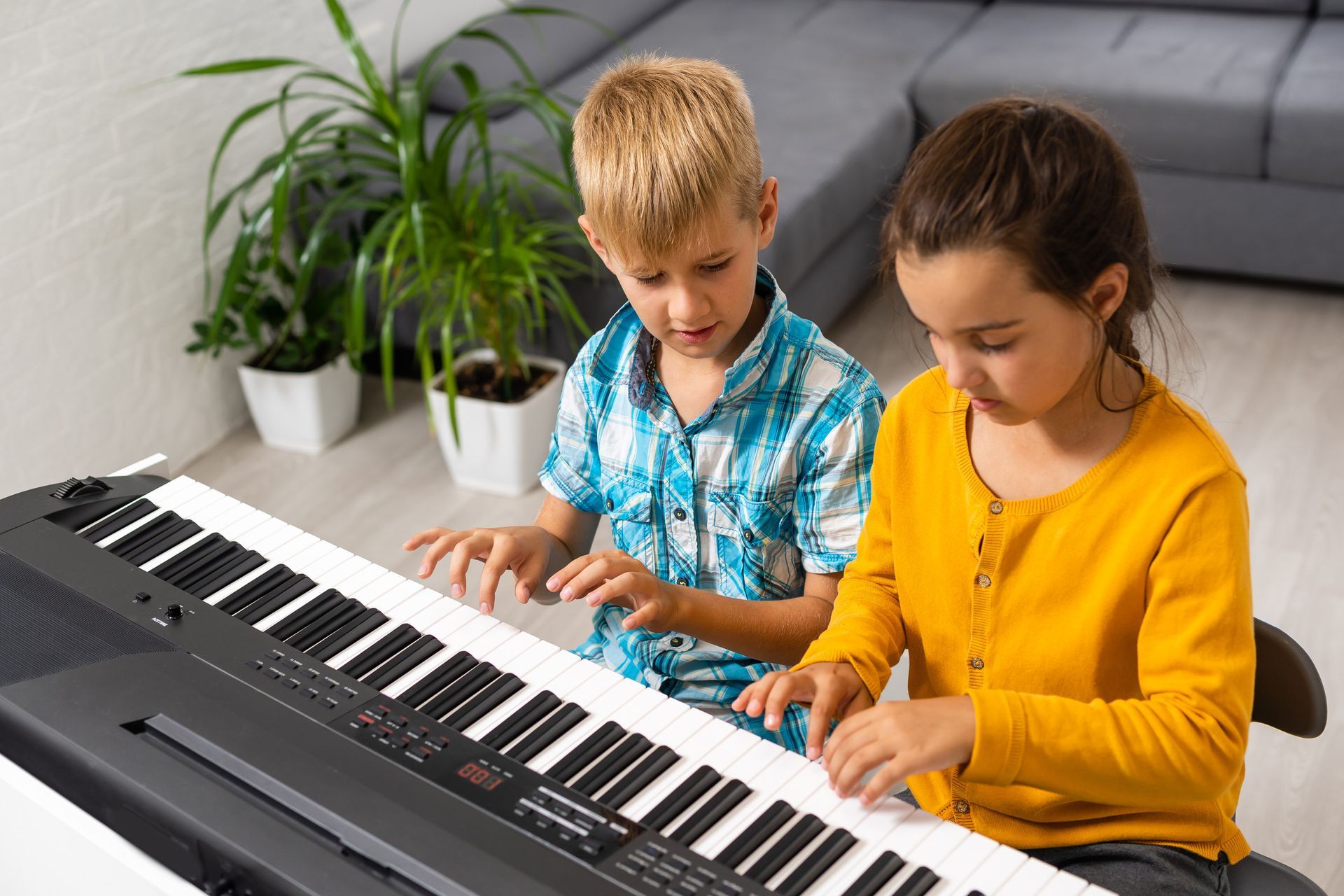 A child learning piano at PrepMe Learning in Jumeirah.
