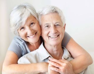Senior Couple Embracing — Cañon City, CO — Commstar Alarms