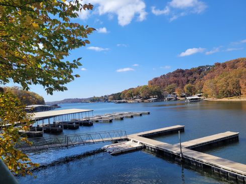 A lake with a lot of docks and boats on it