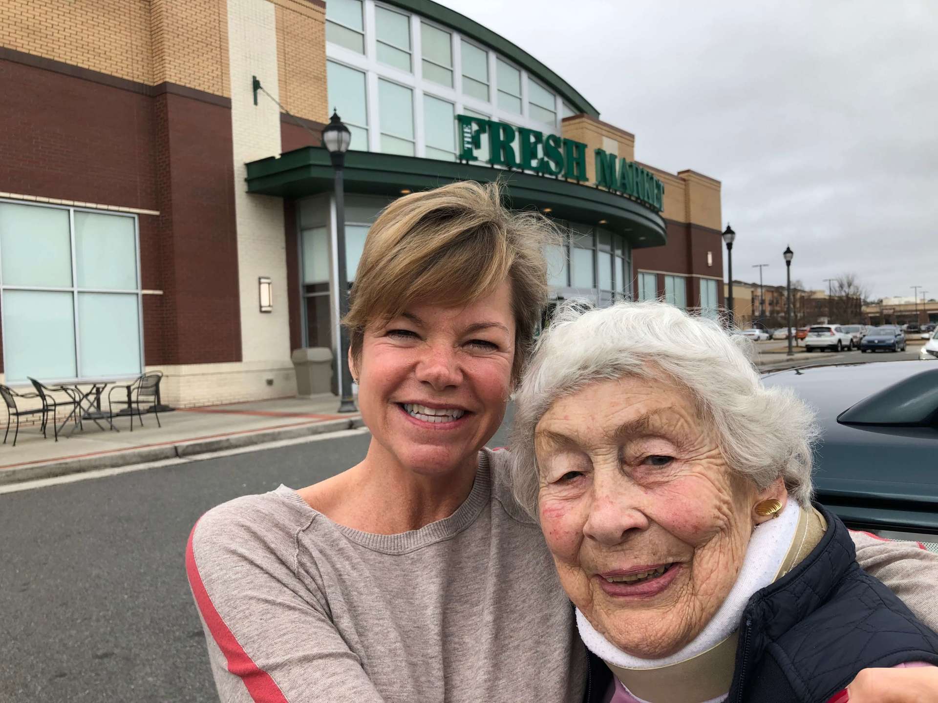 Senior Home Care Client and Caregiver visit the grocery store