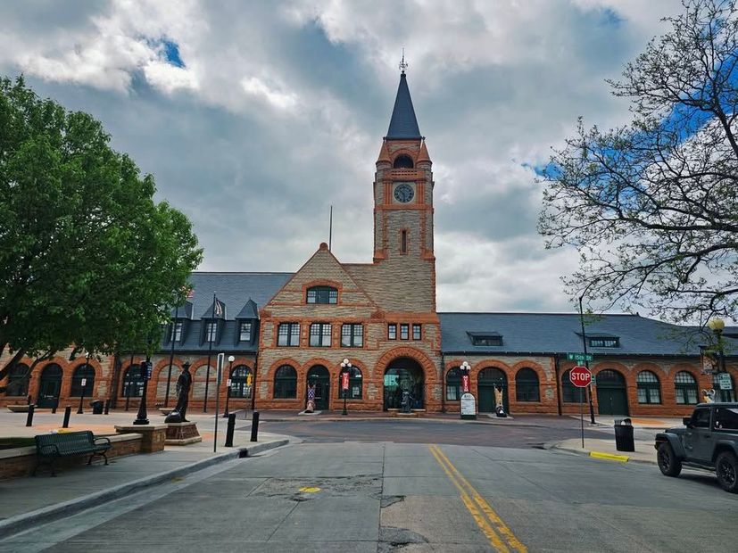 A large brick building with a clock tower on top of it
