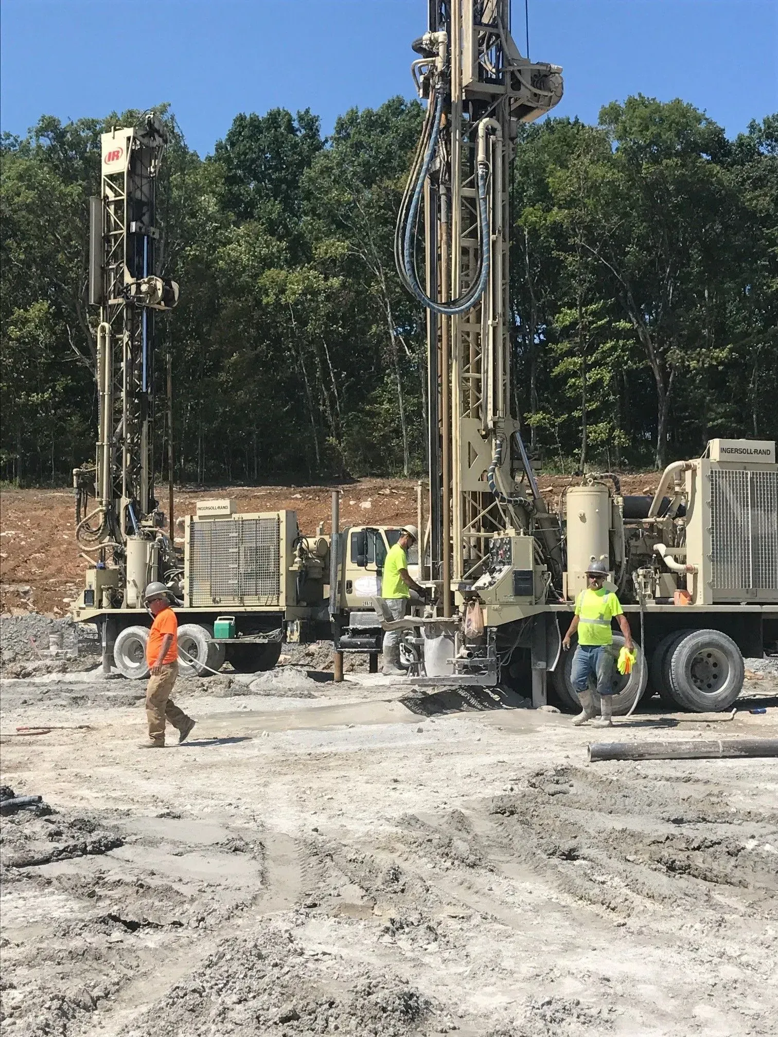 Workers drilling in the open field — Franklin, TN — Henry Drilling LLC