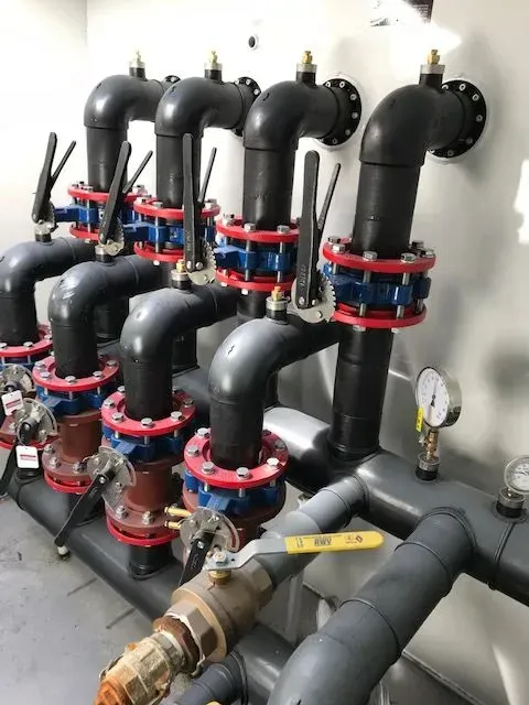 A bunch of pipes and valves — Franklin, TN — Henry Drilling LLC