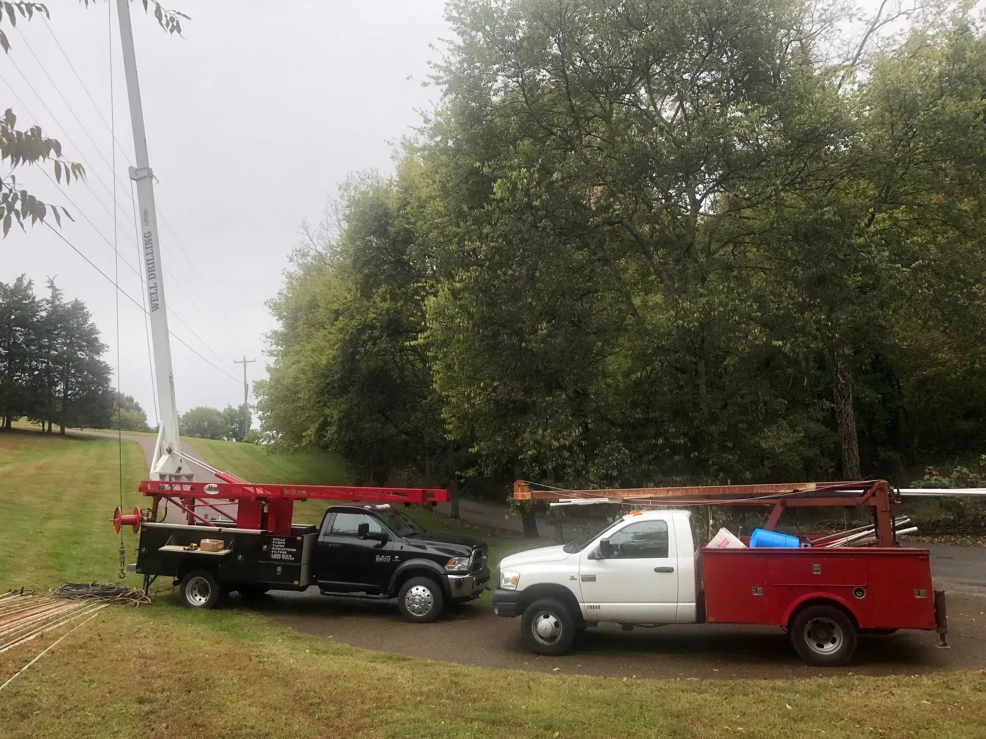 Two trucks are parked next to each other — Franklin, TN — Henry Drilling LLC