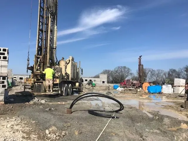 Man is working on a drilling rig on a construction site . — Franklin, TN — Henry Drilling LLC