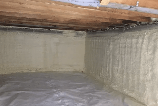 A basement with a lot of foam on the walls and floor.