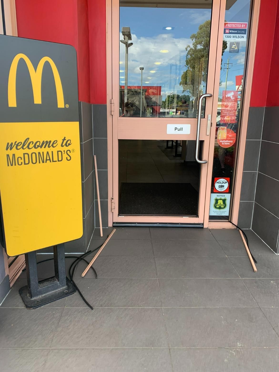 A McDonalds Restaurant With A Sign — Central Coast Glass & Glazing In Umina Beach, NSW