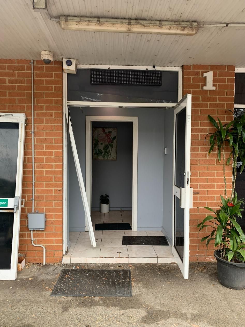 A Brick Building — Central Coast Glass & Glazing In Umina Beach, NSW