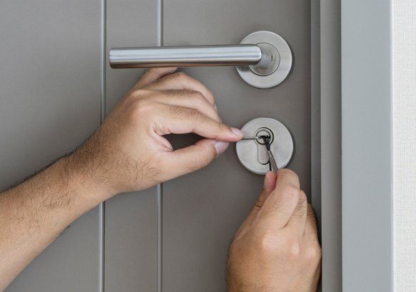 Locksmith Opening Locked Door — St. Paul, MN — Mighty Lock And Safe