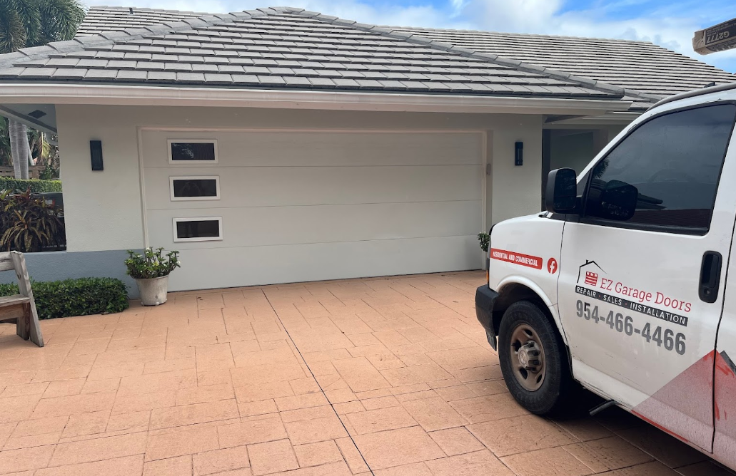 EZ Garage Doors, Broward County FL, Fort Lauderdale FL, Coral Ridge Fort Lauderdale FL, Lighthouse Point FL, Pompano Beach FL, Coral Springs FL, Parkland FL, Hollywood FL, Dania Beach FL, Oakland Park FL, Coconut Creek FL, Plantation FL, Deerfield Beach FL, Palm Beach County FL, Boca Raton FL, Boca Del Mar FL, Delray Beach FL, West Palm Beach FL, Palm Beach FL, Riviera Beach FL, Garage Door Company, Garage Door Company Near Me, Commercial Garage Door Company, Garage Door Installation, Garage Door Installation Near Me, Garage Door Repair, Garage Door Repair Near Me, Blocked Garage Sensor, Broken Garage Spring, Garage Roller Malfunction, Garage Motor Issues, Faulty Garage Door Opener, Broken Garage Door Opener, Residential Garage Door, Commercial Garage Door, Industrial Garage Door, Residential Garage Door Tune-Ups, Garage Cable Replacement, Garage Roller Replacement, Garage Spring adjustments, Garage Spring replacements, Garage Door Openers, New Garage Opener, Garage Opener Remote, Garage Door Opener Installation, Garage Opener Repair, Garage Sensor Replacement, Garage Chain Replacement, Garage Door Keypad, Garage Keypad Replacement, Garage Door Keypad Installation, Garage Door Keypad Programming, Garage Door Remote, Garage Door Remote Installation, Garage Door Remote Programming, Fort Lauderdale Garage Door Company, Palm Beach Garage Door Company, West Palm Beach Garage Door Company, Boca Raton Garage Door Company, West Palm Beach Garage Door Company, Parkland Garage Door Company, Delray Beach Garage Door Company, Truck Roll Up Door Repair, Box Truck Roll Up Door Replacement, Box Truck Roll Up Door Installation