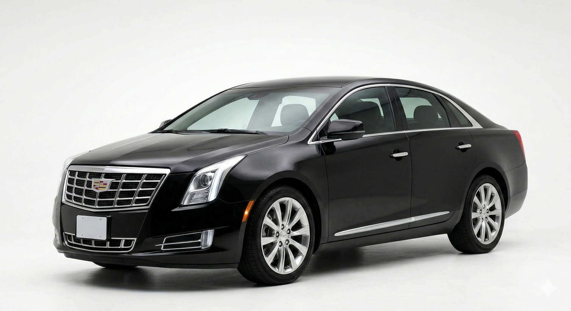 A black Cadillac sedan is shown on a white background.