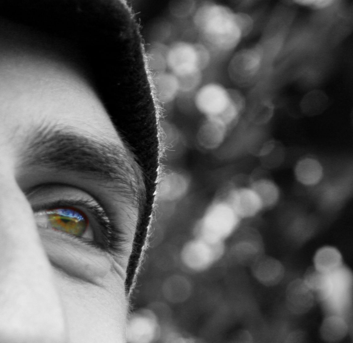 Man's Eye Colour Highlighted in Black and White Photo — Photographer in Pacific Heights, QLD