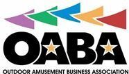 The logo for the Outdoor Amusement Business Association (OABA) with colorful pennant flags above the black bold text.