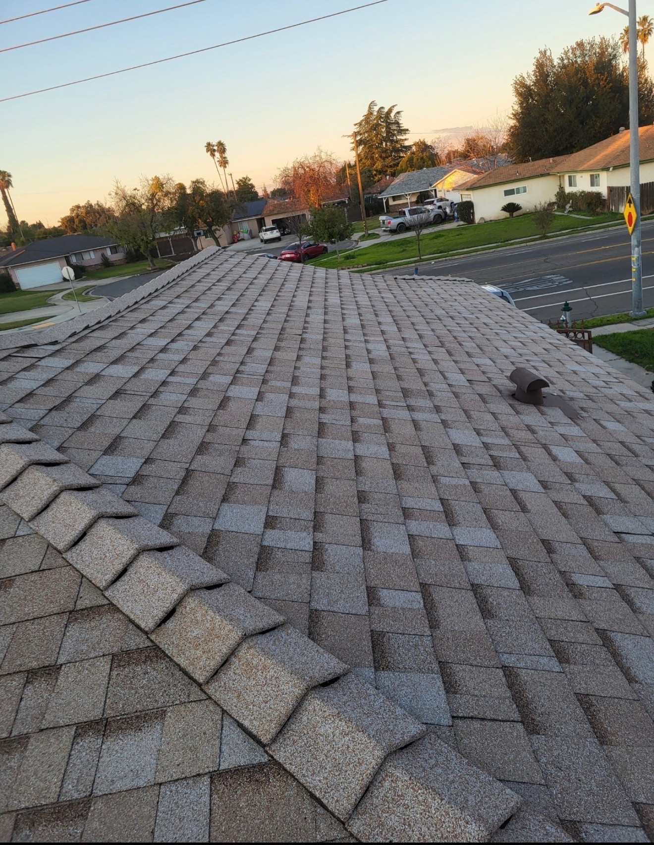 Roofing with a sunset