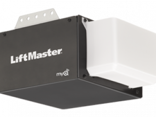A lift master garage door opener is sitting on a white surface.
