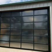 A garage door with a lot of windows on it.