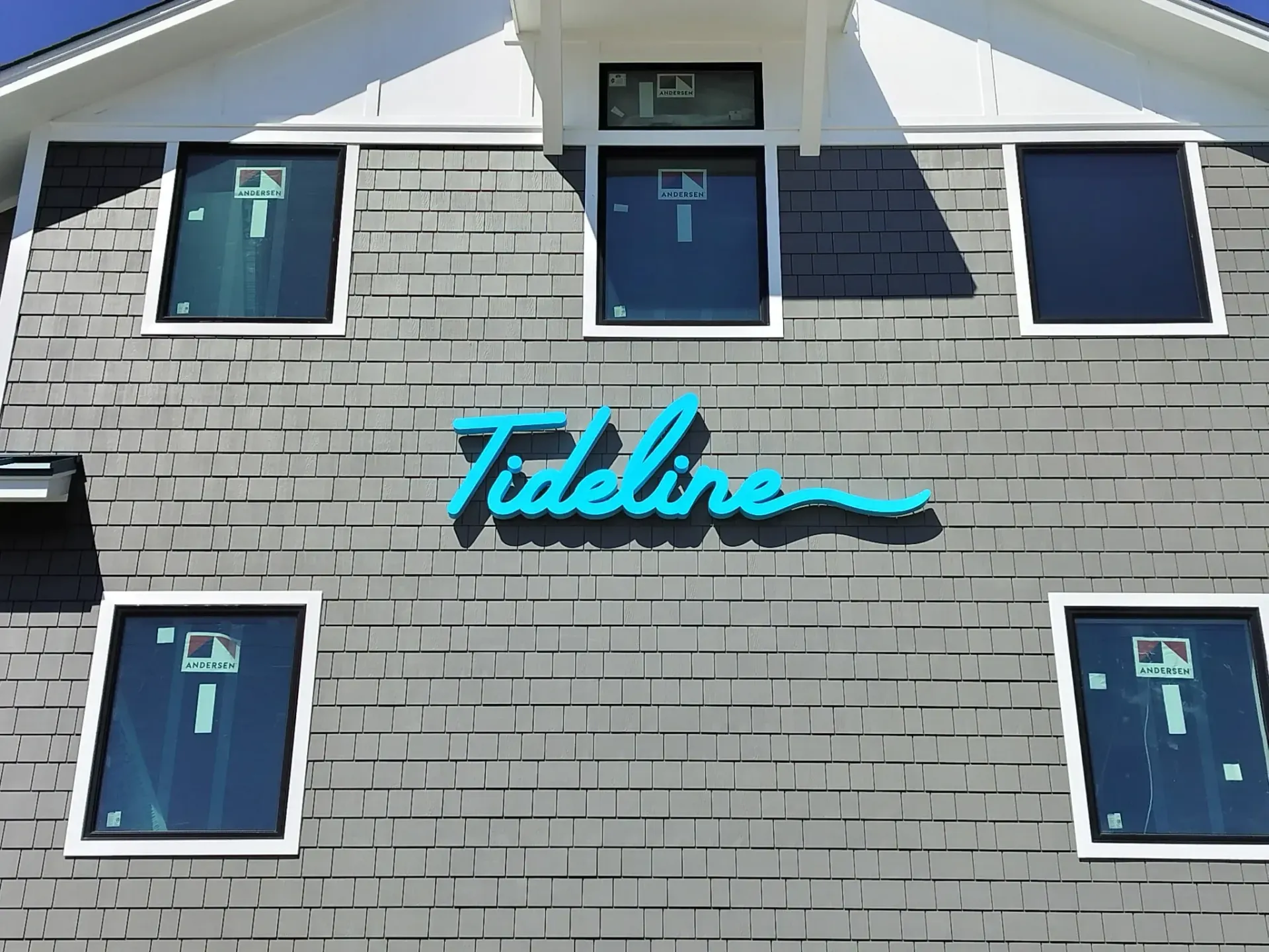 A glass door with a nautica donut logo on it in Northfield, NJ.