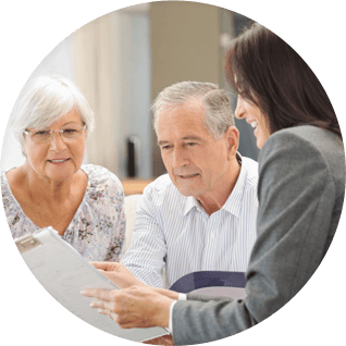 Older couple discussing wills and probate with solicitor