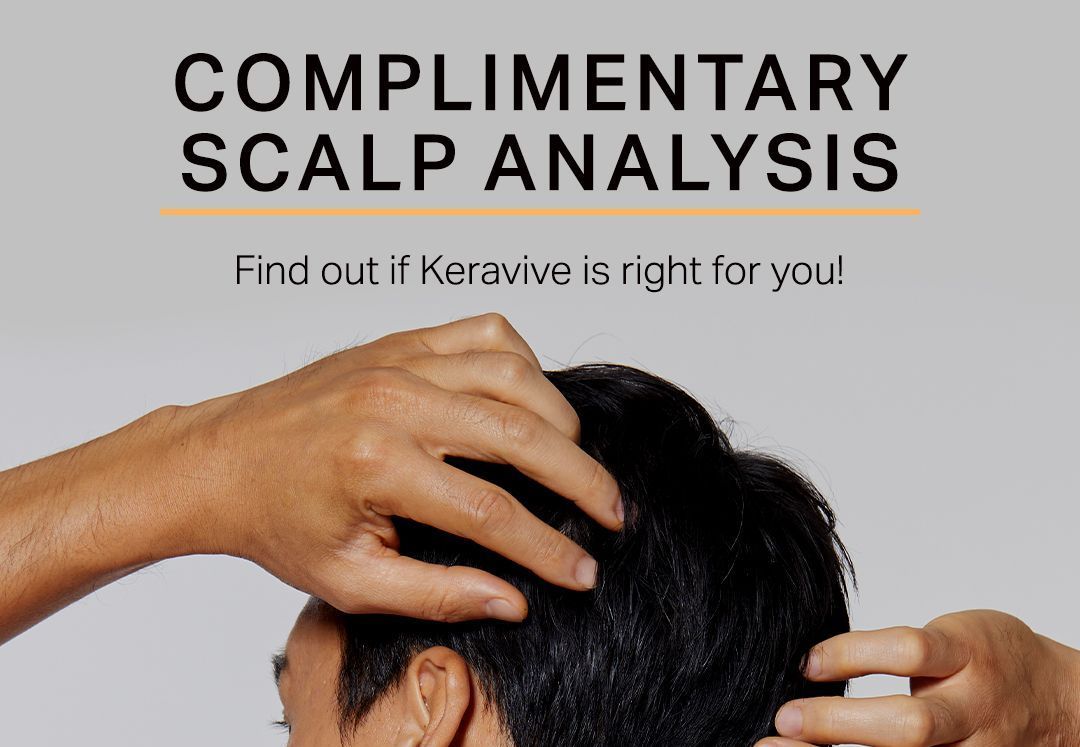 A man is getting a complimentary scalp analysis from someone