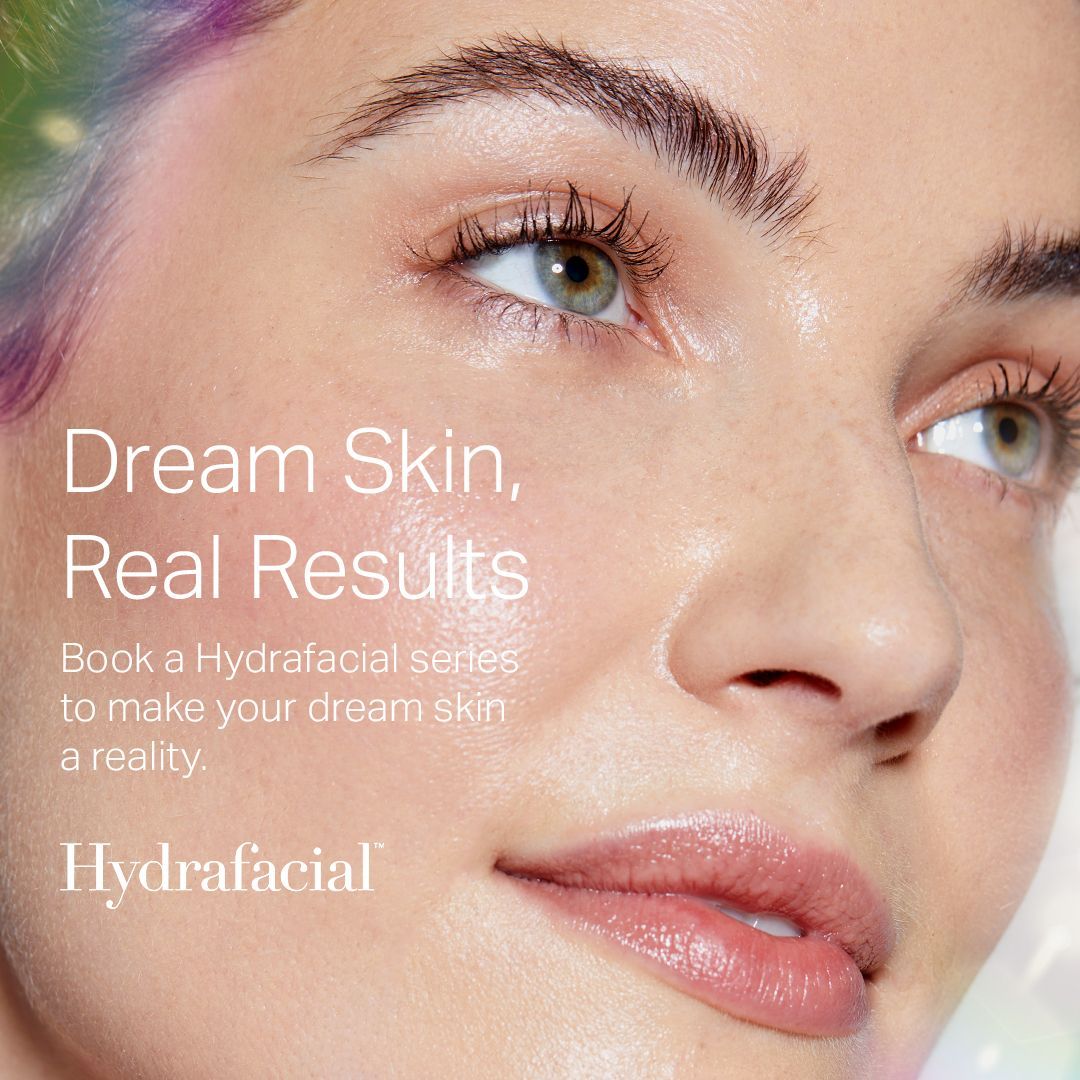 A close up of a woman 's face with the words `` dream skin , real results '' written on it.