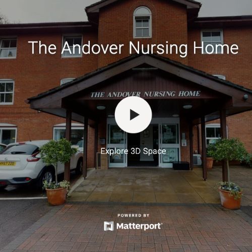 A brick building with the words Andover Care Home