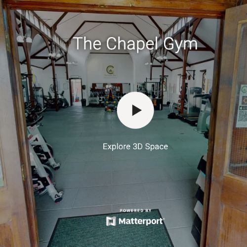 A virtual tour of the chapel gym with a play button