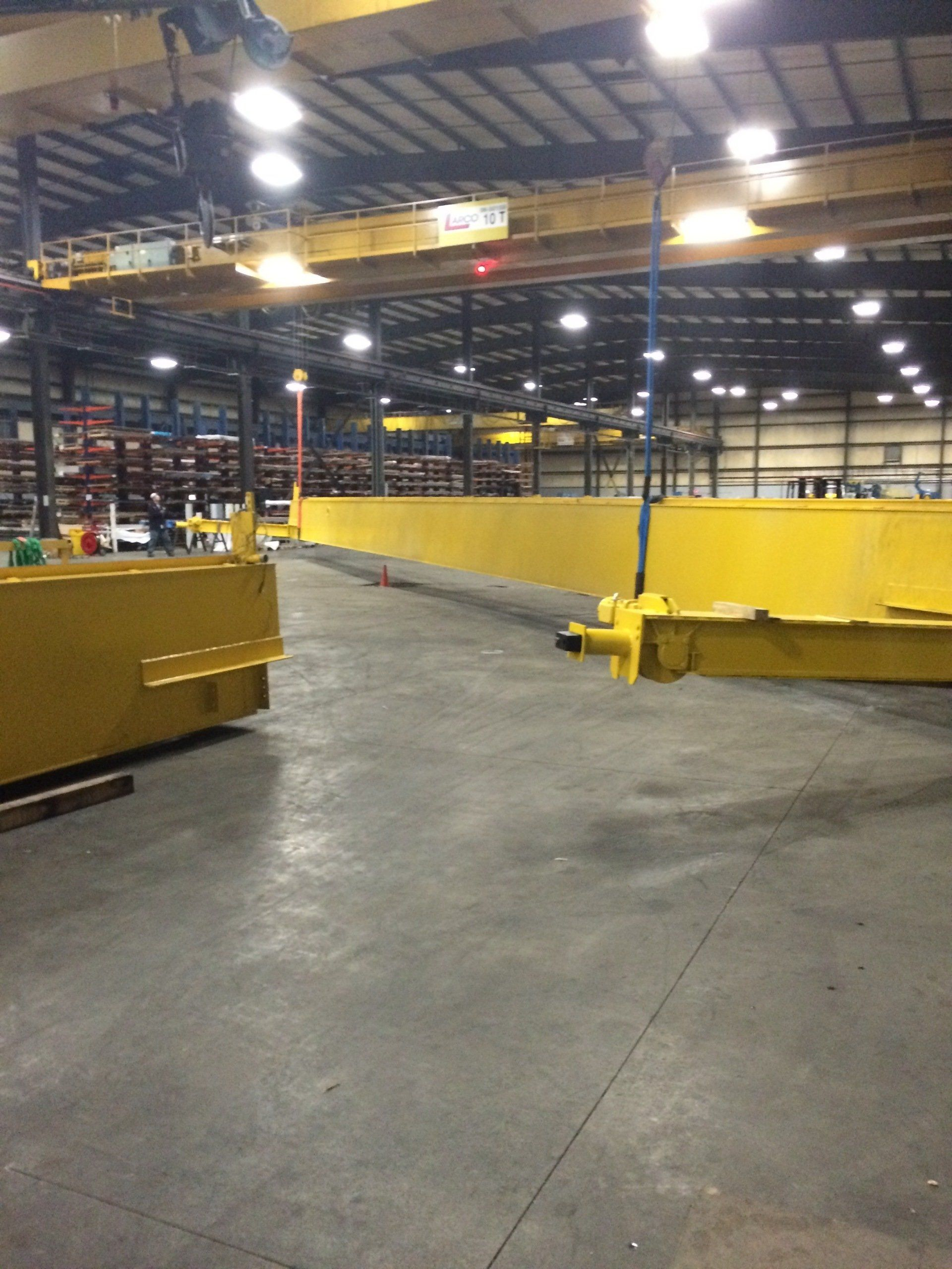 A large warehouse with a lot of yellow objects