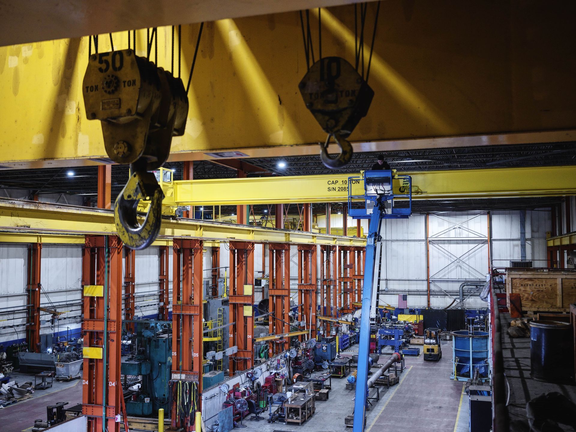 A yellow crane with the number 50 on it