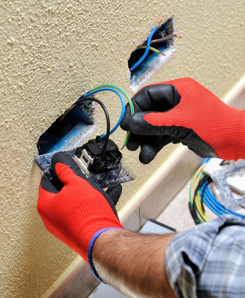 Professional Electrician Repairing a Residential  Socket