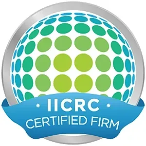 An iicrc certified firm logo with a blue ribbon