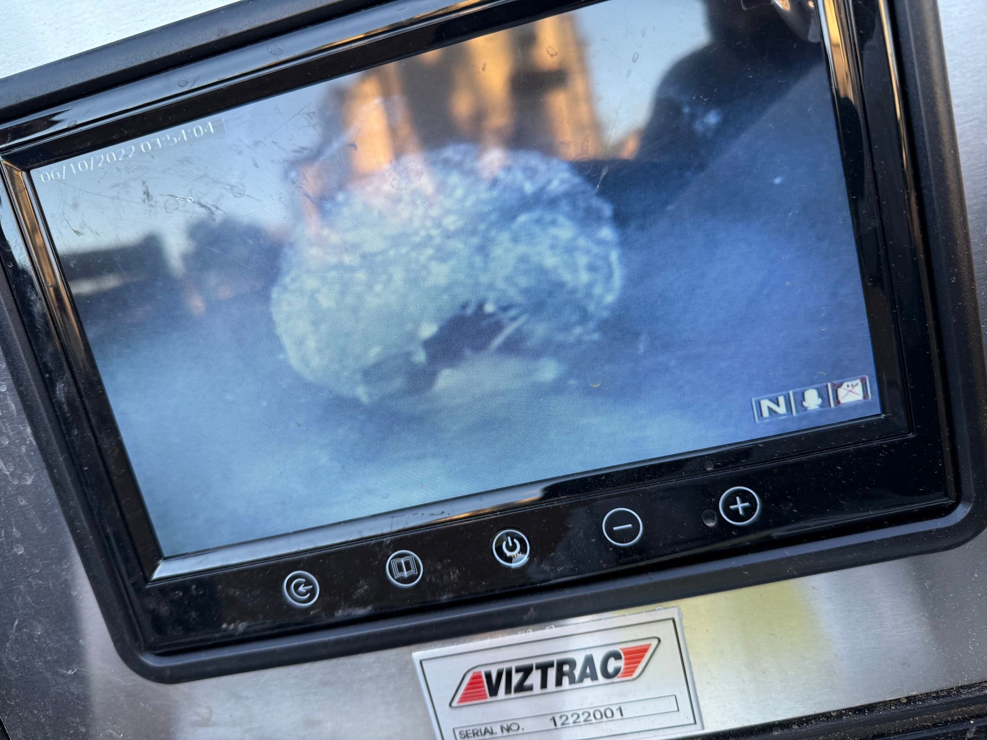A viztrac monitor shows a picture of a rock on the screen.