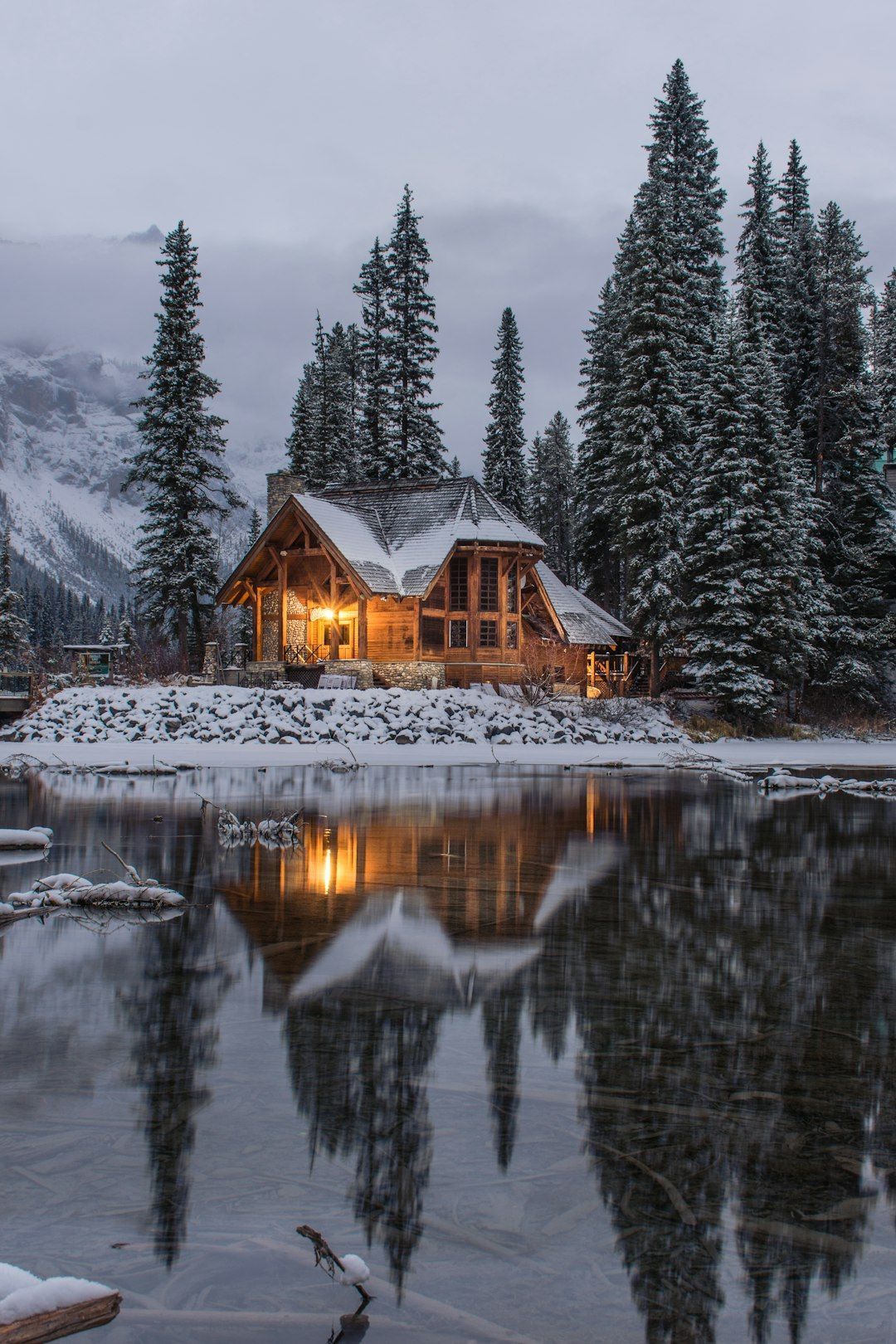 Snowy Cabin on a lake