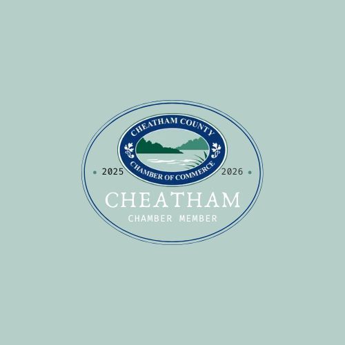 Cheatham County Chamber of Commerce logo with lake and forest scene in blue and green. Text says 