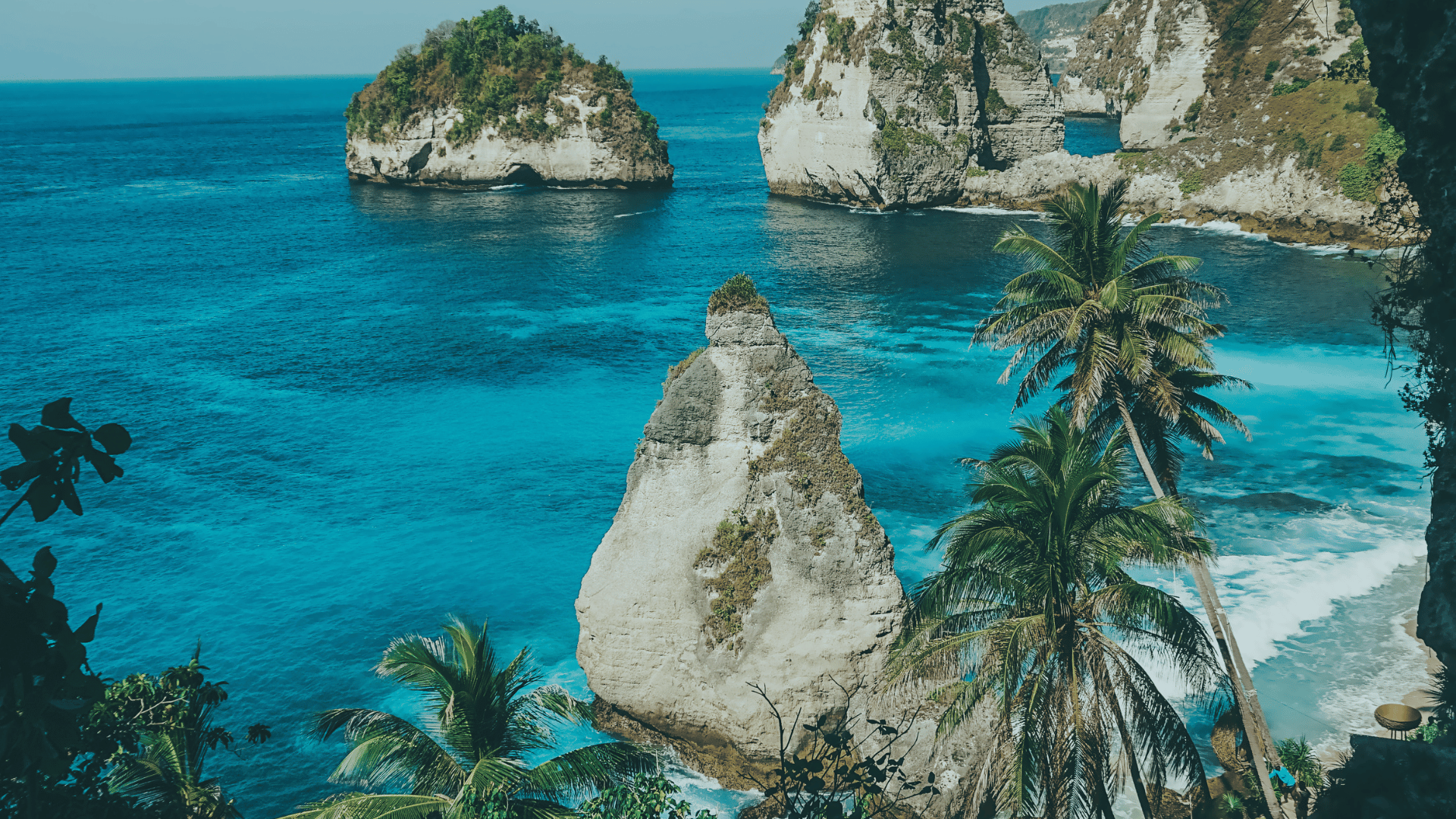 view of Diamond Beach, Nusa Penida from the cliff, turquoise water and unique rock formations