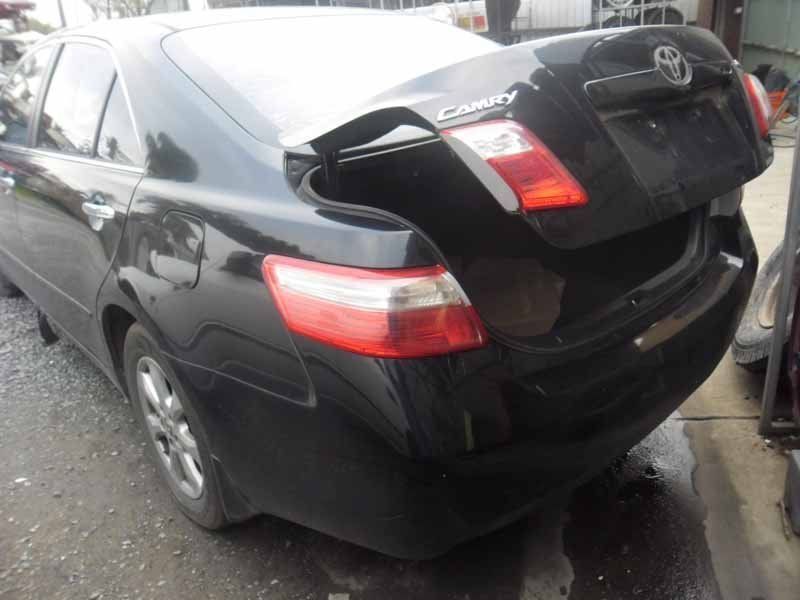 black car with trunk open