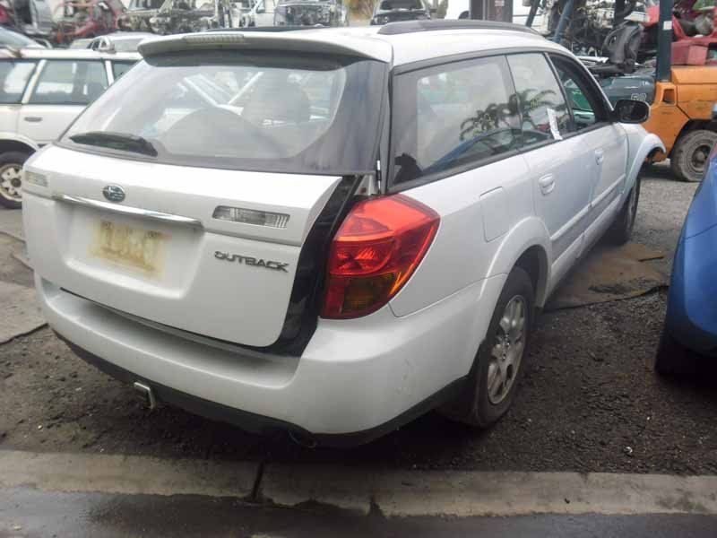 white car with trunk open