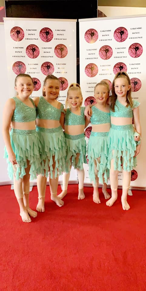 Young Girls Smiling  Back Stage — Dance Lessons in Medowie, NSW