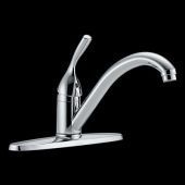 A close up of a kitchen sink faucet on a black background.