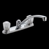 A kitchen sink faucet with clear handles on a black background.