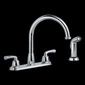 A kitchen faucet with a sprayer attached to it on a black background.