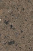 A close up of a brown granite counter top.