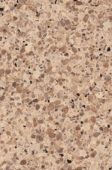 A close up of a brown and white granite counter top.