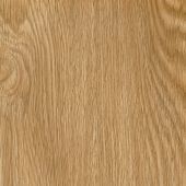 A close up of a piece of wood showing the grain and texture.