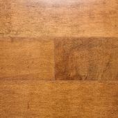 It is a close up of a wooden floor.