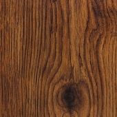 A close up of a piece of wood with a hole in it.