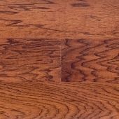 A close up of a wooden floor with a grain pattern.