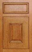 A close up of a wooden door with a square in the middle.