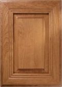A close up of a wooden cabinet door with a square frame.