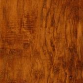 A close up of a piece of wood showing the grain and texture.