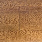 A close up of a wooden floor with a pattern on it.